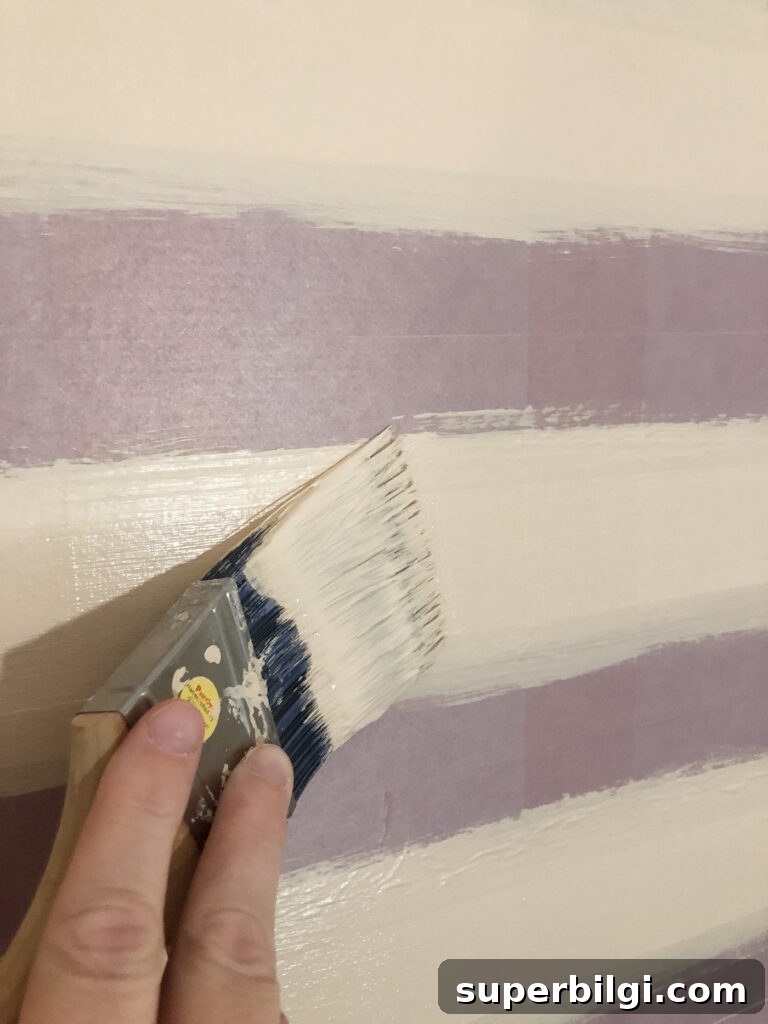 Step-by-Step DIY Plaid Accent Wall Tutorial 11 Painting Horizontal Lines