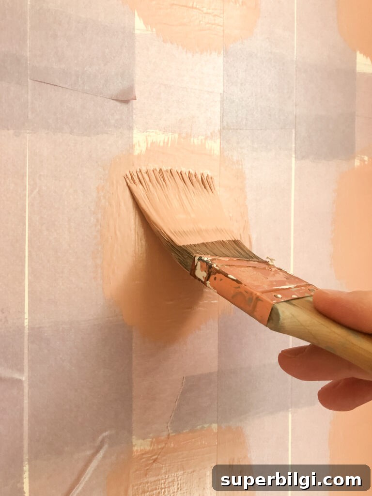 Step-by-Step DIY Plaid Accent Wall Tutorial 13 Paint the middle square on a plaid wall