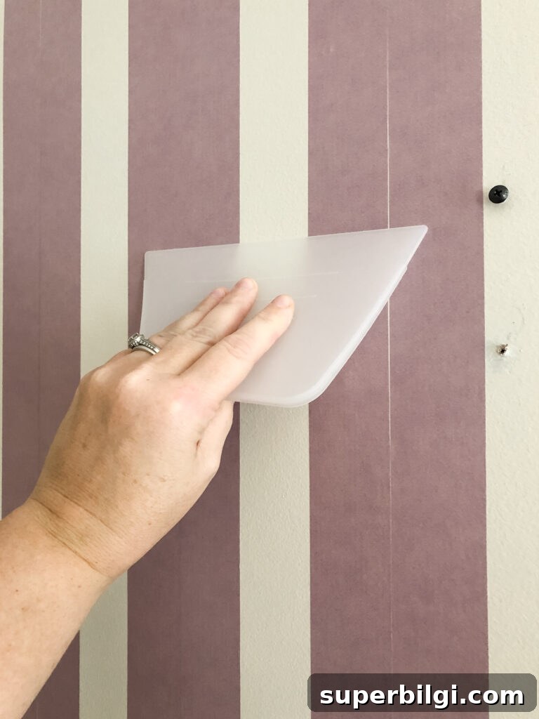 Step-by-Step DIY Plaid Accent Wall Tutorial 7 Press down painter's tape