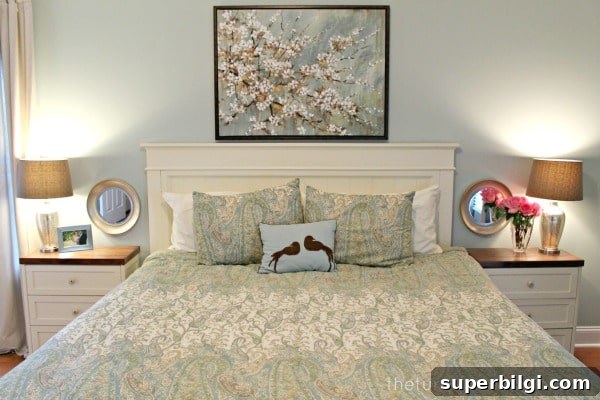 How to Make Your Bed Like a Pro in 6 Steps 3 Master Bedroom with a Large Piece of Art over the Bed