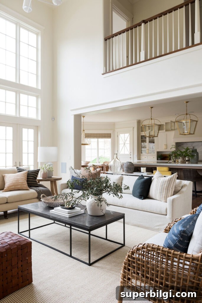 Benjamin Moore Swiss Coffee Paint: Shade, Uses and Pairings 3 large airy living room painted in Swiss Coffee by Benjamin Moore