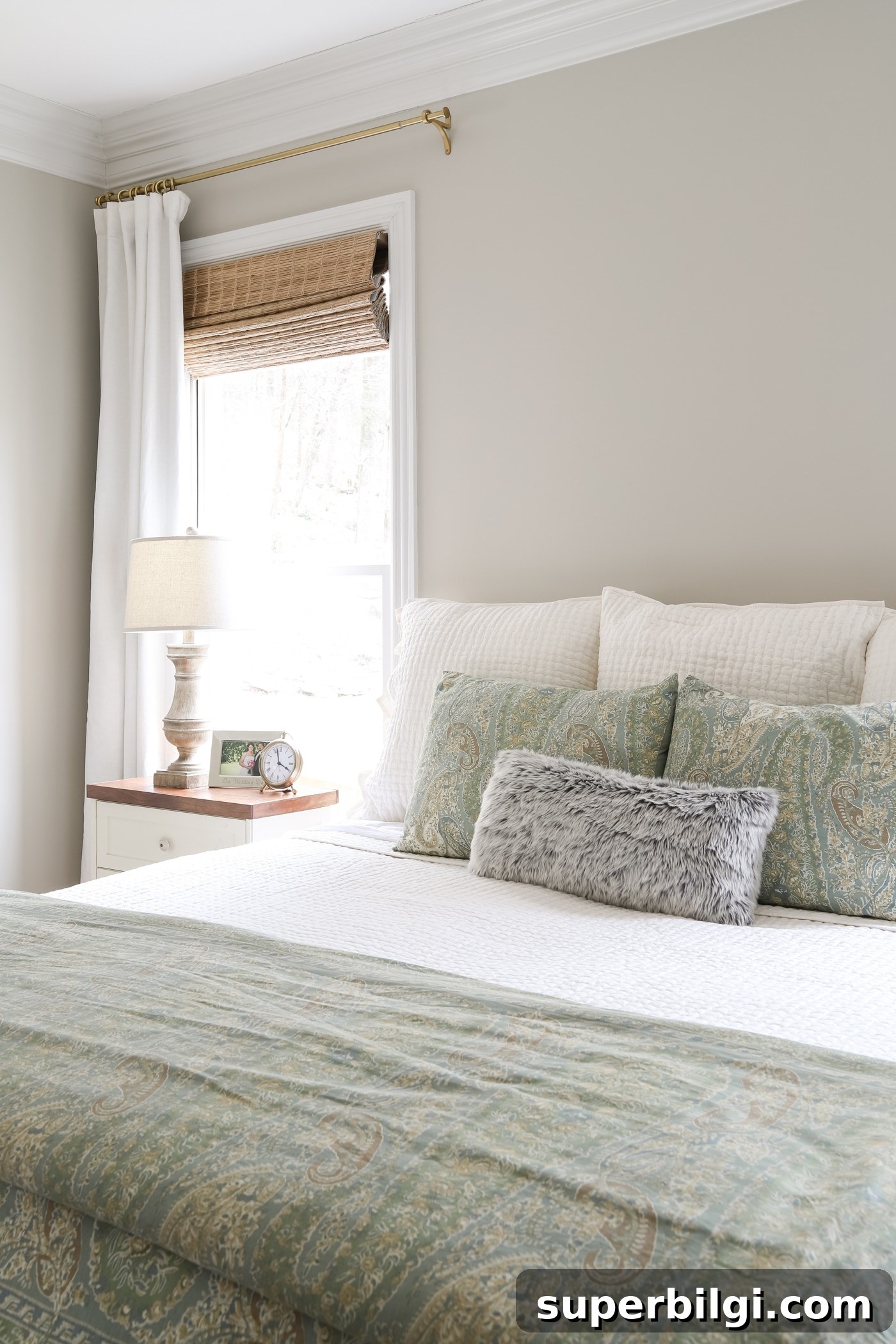 One-Year Home Makeover: Before and After Tour 14 Master bedroom with brass curtain rods and ivory curtains