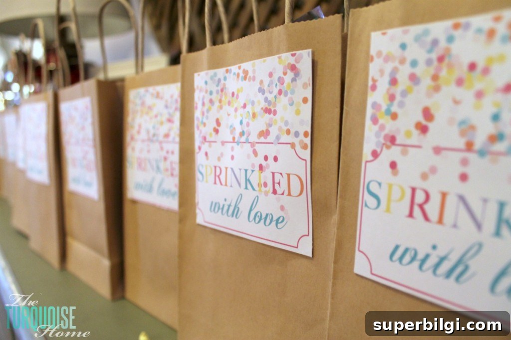 Sprinkle-Themed Birthday Party: Ideas, Decor and Checklist 14 Sprinkled with Love Treat Bags #sprinkles #birthday