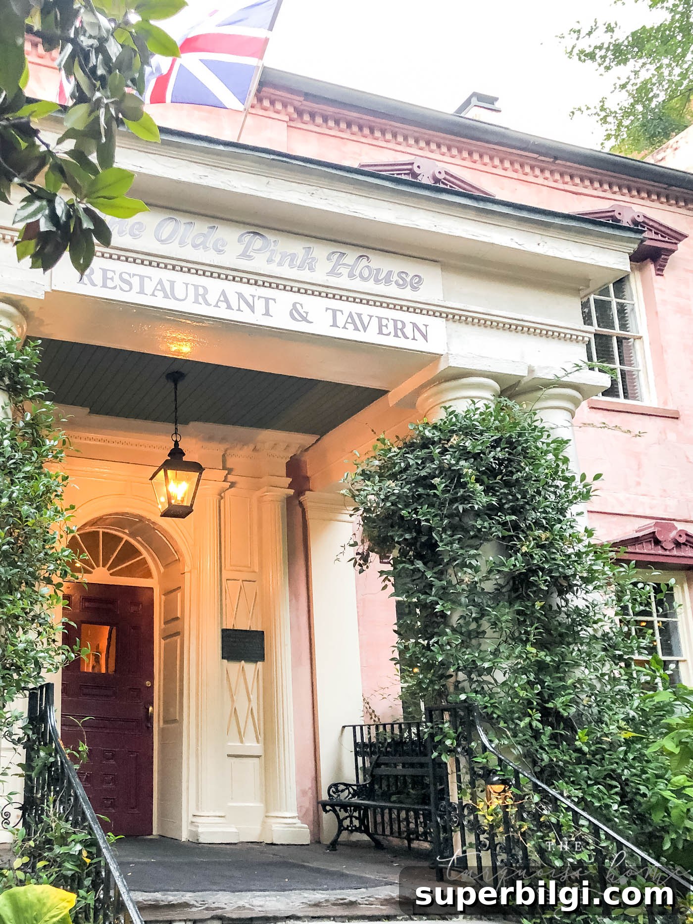 15 Haint Blue Paint Colors to Brighten Porch Ceilings 6 The Olde Pink House with a dark blue-green porch ceiling.