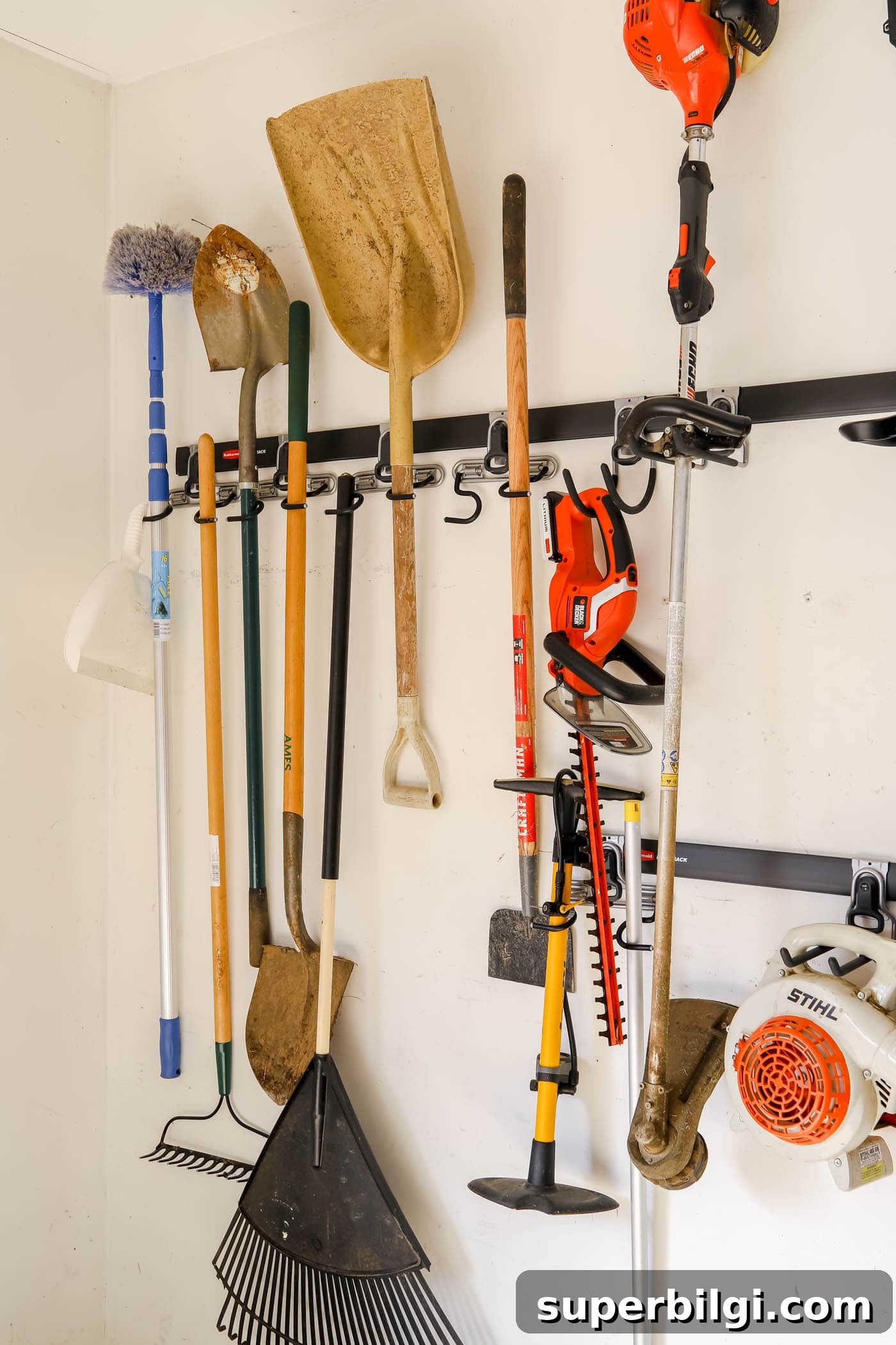 Garage Organization: Transform Your Messy Garage in 7 Steps 15 Rubbermaid Fastrack Track System