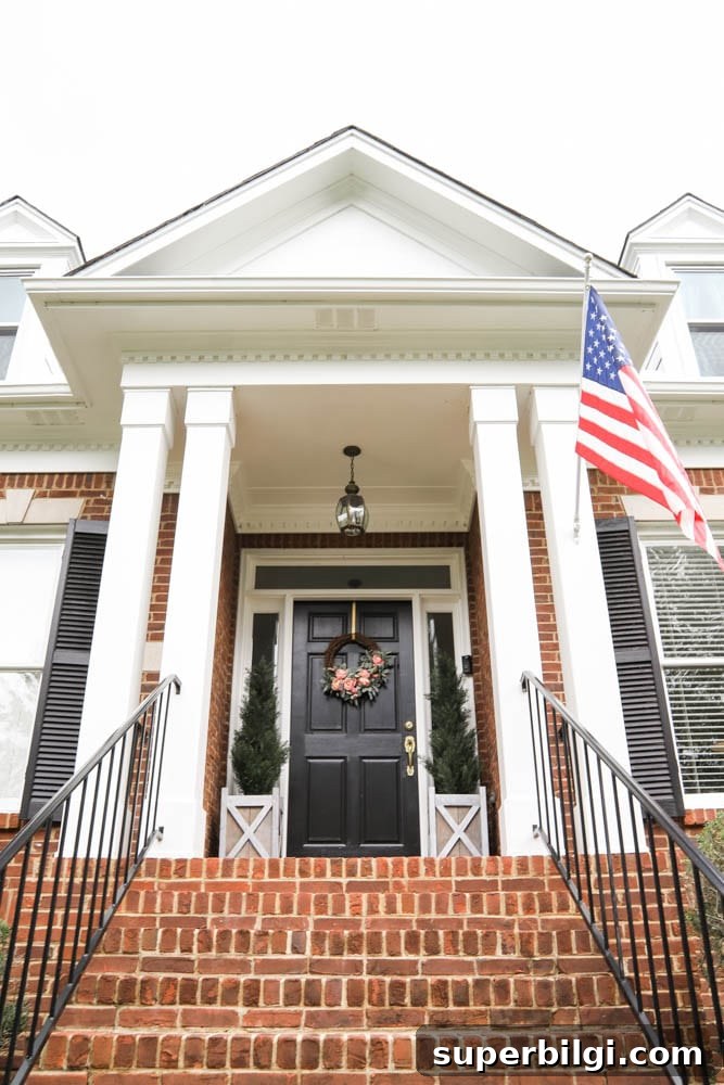 Brick Home Exterior Makeover: White Trim and Black Shutters 7 White Painted Porch and Brick House