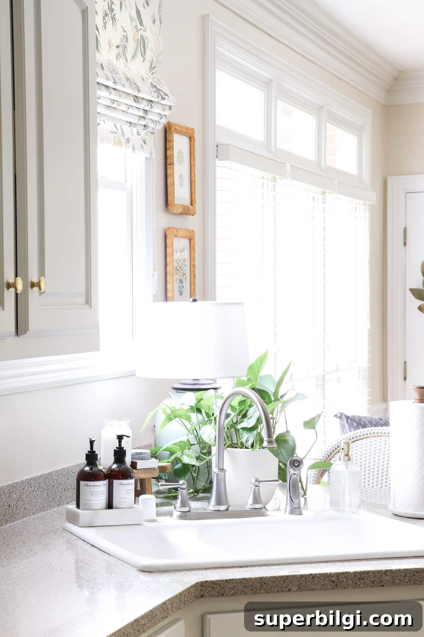 7 Kitchen Refresh Ideas That Transform Your Space 11 White Sink, Marble Soap Tray and Lamp Behind Sink