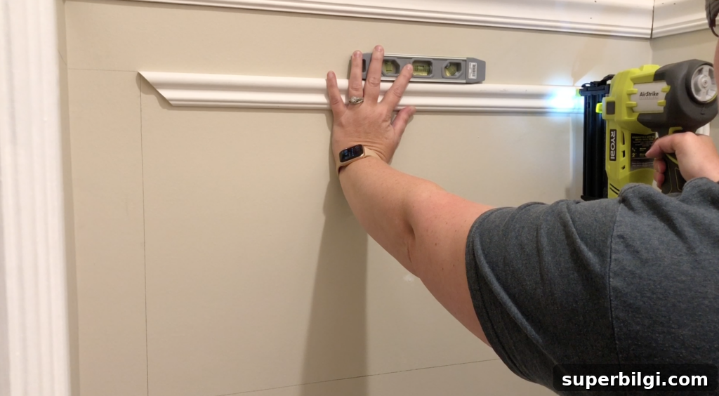 DIY Picture Frame Molding Tutorial 12 How to Install Trim on the Wall
