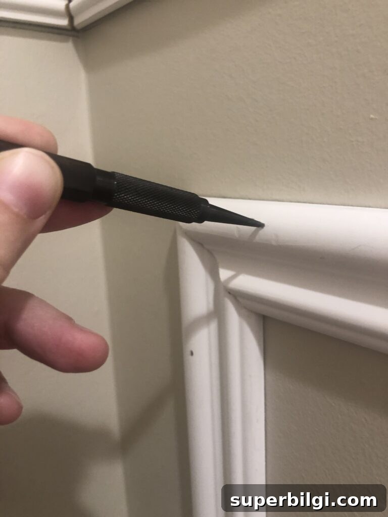 DIY Picture Frame Molding Tutorial 16 Nail Punch