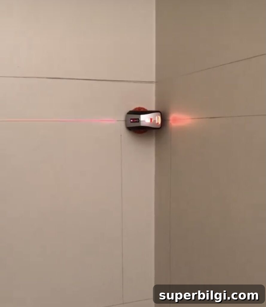 DIY Picture Frame Molding Tutorial 7 Laser Level on Wall
