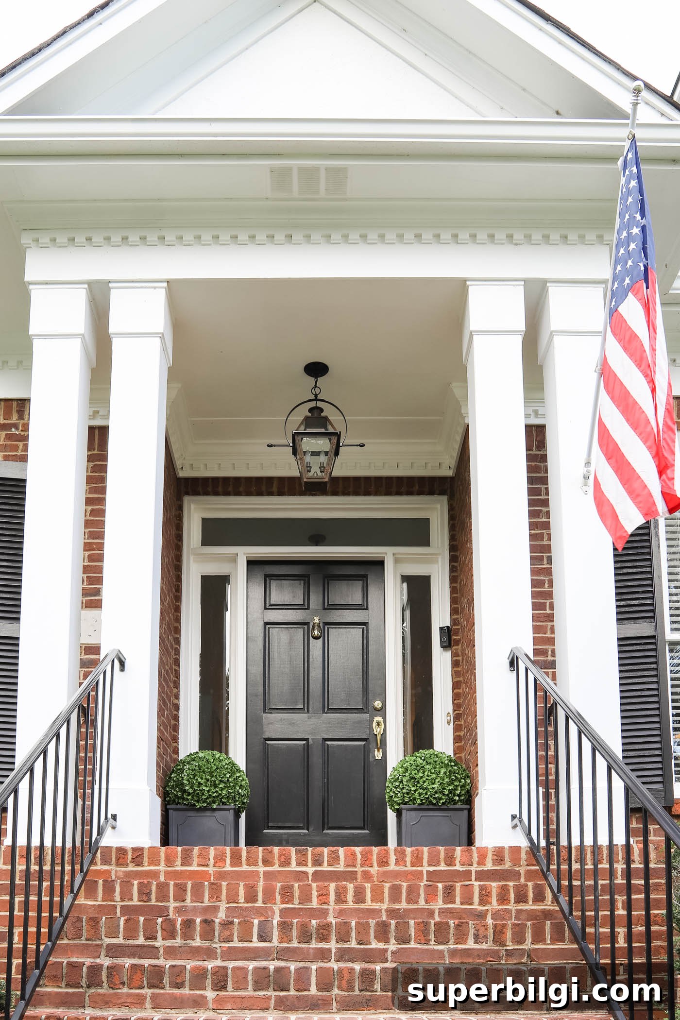 Boost Your Home's Curb Appeal With Front Yard Upgrades 7 Brick Cape Cod Porch with Black Door