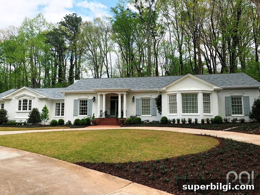 Sherwin-Williams Alabaster: Paint Color Guide and Uses 11 House painted Sherwin Williams Alabaster with a gray roof