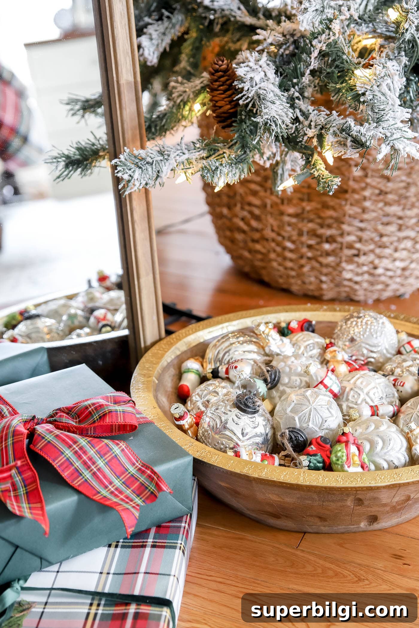 Christmas Decor Ideas for Your Primary Bedroom 5 ornaments in a bowl under a tree