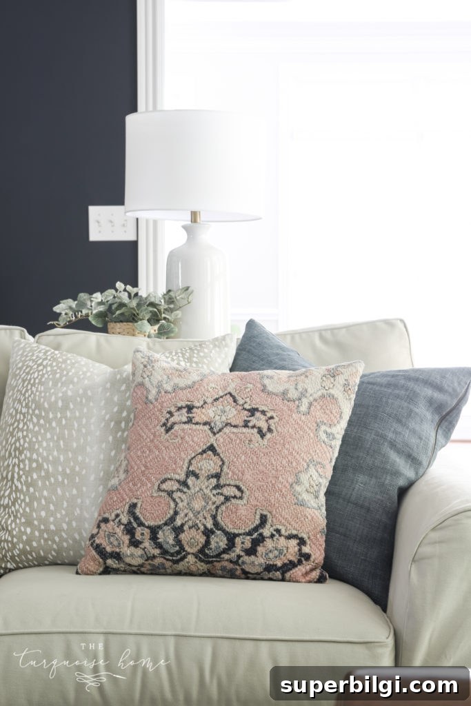 Pretty Pink Home Decor Ideas to Refresh Any Room 4 Throw Pillow Arrangement on a Sofa