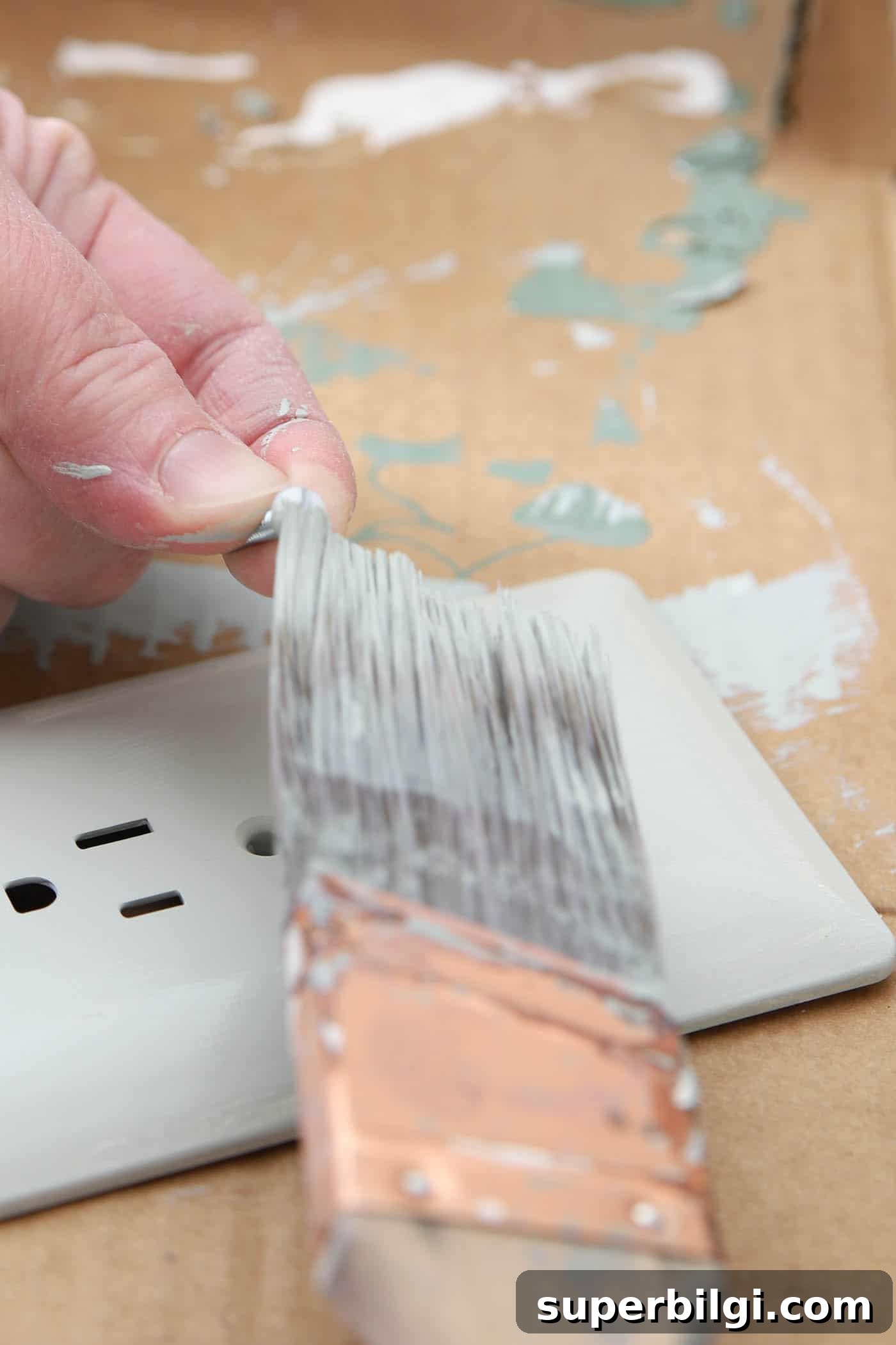 How to Paint Outlet Covers for a Seamless Finish 5 Paint the outlet screw, too!