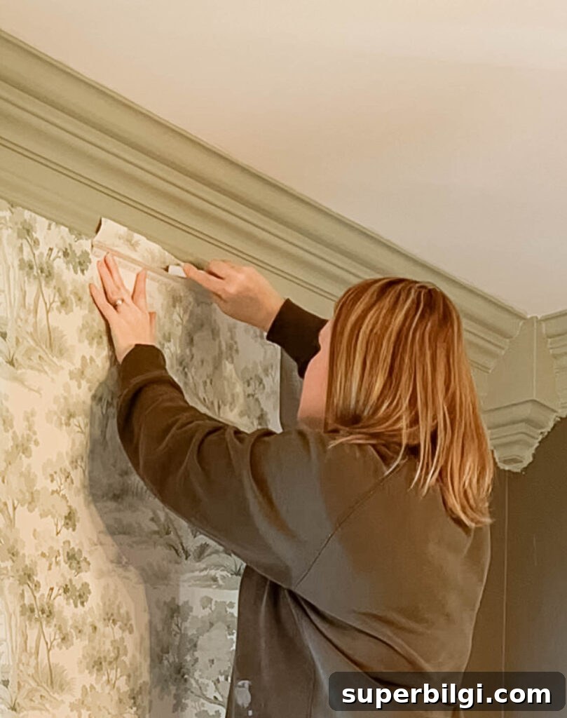 How to Install Paste-the-Wall Wallpaper 5 Cut away excess wallpaper