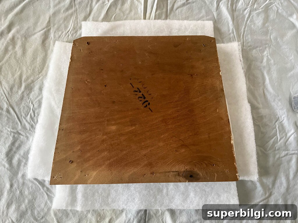 Reupholster Dining Chair Seats: Step-by-Step DIY 10 Notch out the corners of the batting