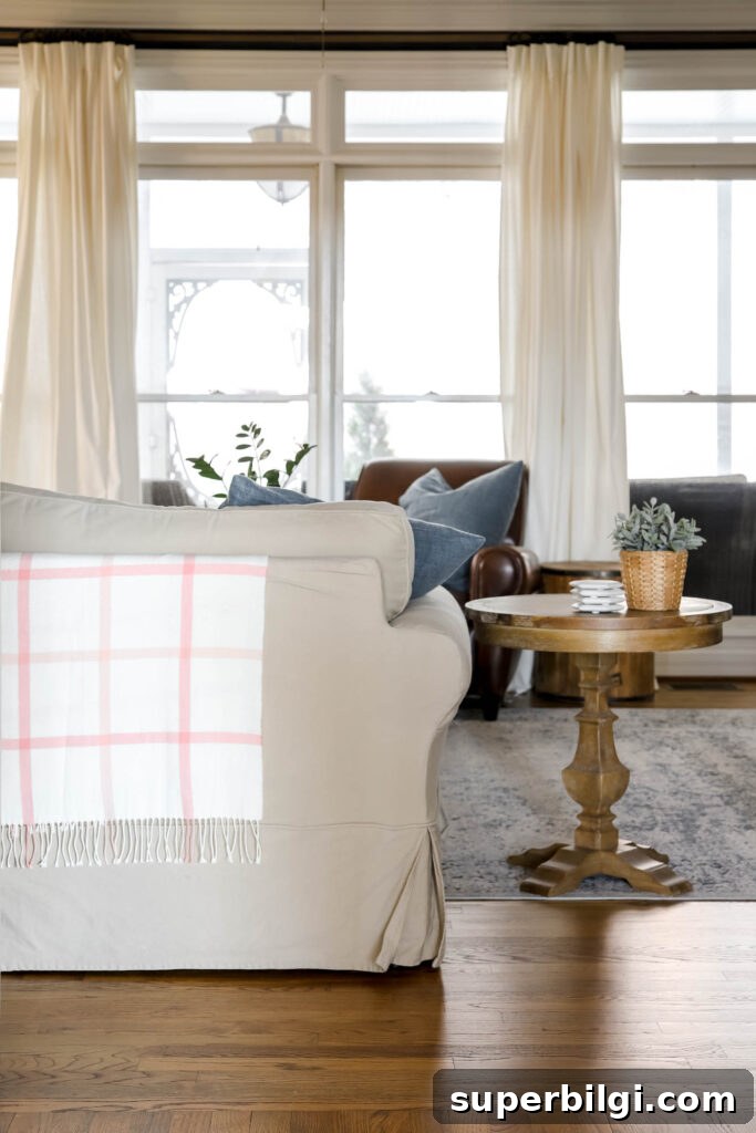 9 Spring Home Decor Ideas to Brighten Your Space 6 Spring sofa with pink windowpane throw blanket