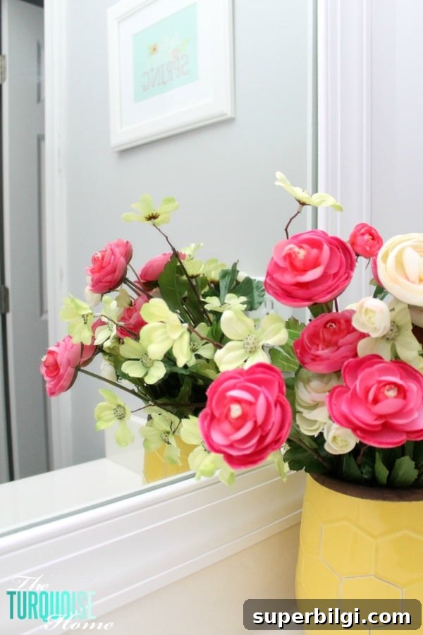 Frame a Builder-Grade Mirror: DIY Bathroom Upgrade 3 This simple DIY is easy and cheap! LOVE the custom look! | How to Frame a Builder-Grade Mirror | TheTurquoiseHome.com