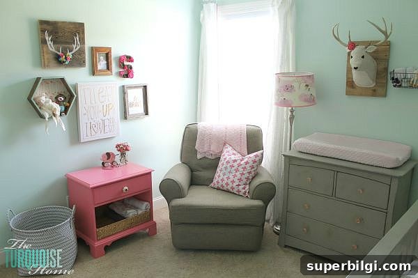 Room-by-Room Paint Colors in My Home 8 All of the pretty pink and turquoise touches with a woodland theme make a sweet retreat for any little girl. | Baby Girl's Woodland Nursery | All the details at TheTurquoiseHome.com