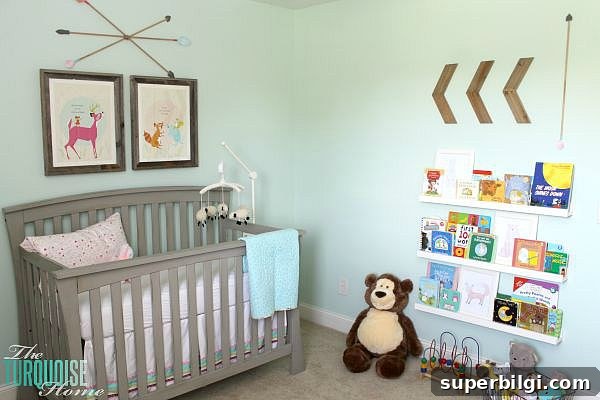 Room-by-Room Paint Colors in My Home 9 All of the pretty pink and turquoise touches with a woodland theme make a sweet retreat for any little girl. | Baby Girl's Woodland Nursery | All the details at TheTurquoiseHome.com
