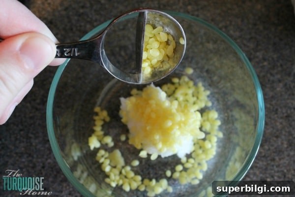 DIY All-Natural Lip Balm Recipe 5 Filling lip balm tubes with homemade balm
