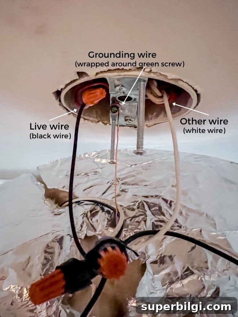 Replace a Light Fixture: Step-by-Step Safety Guide 8 Attach new light fixture wires