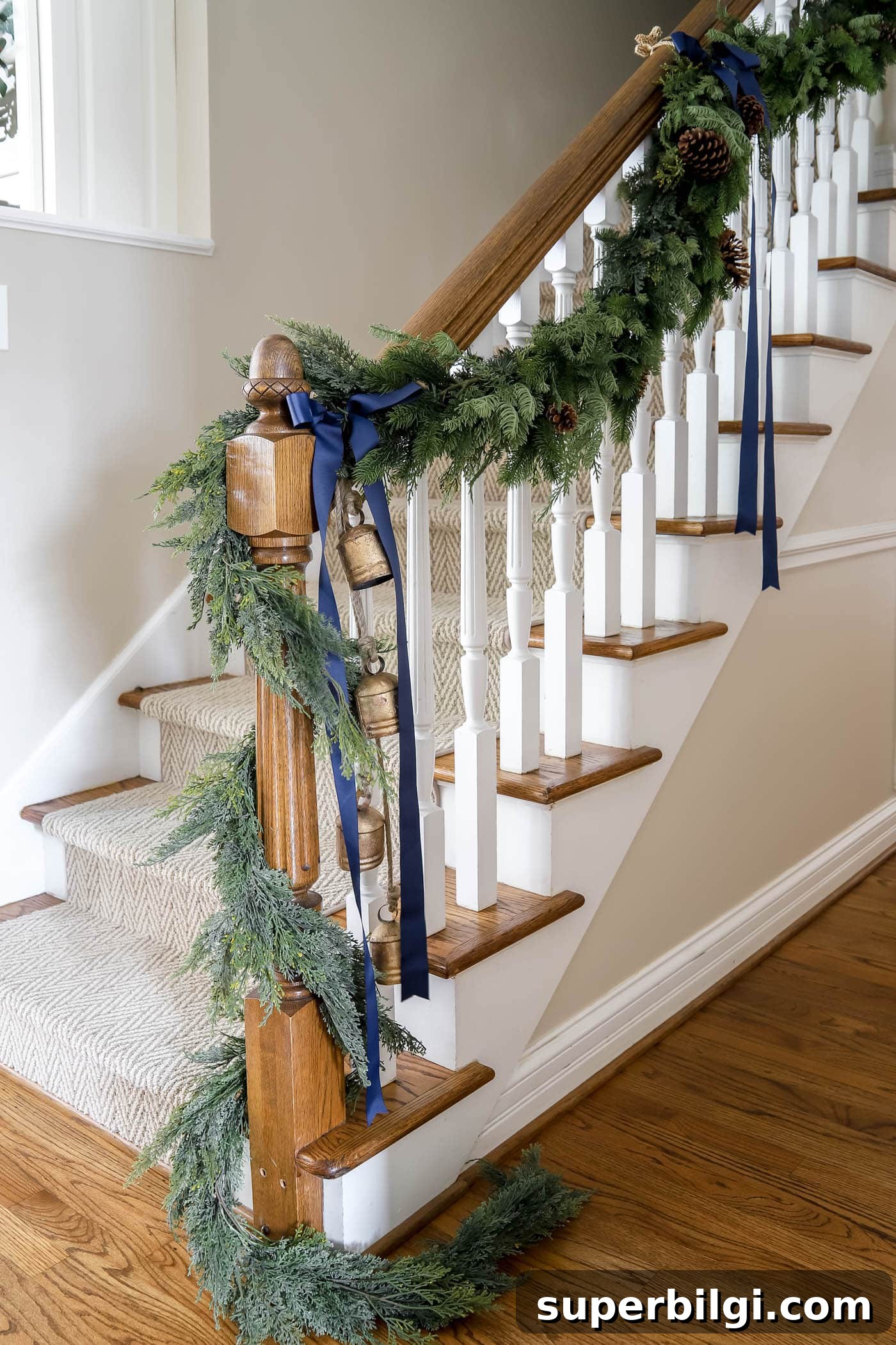 How to Hang Garland on a Staircase or Banister 2 Garland on the Stairs