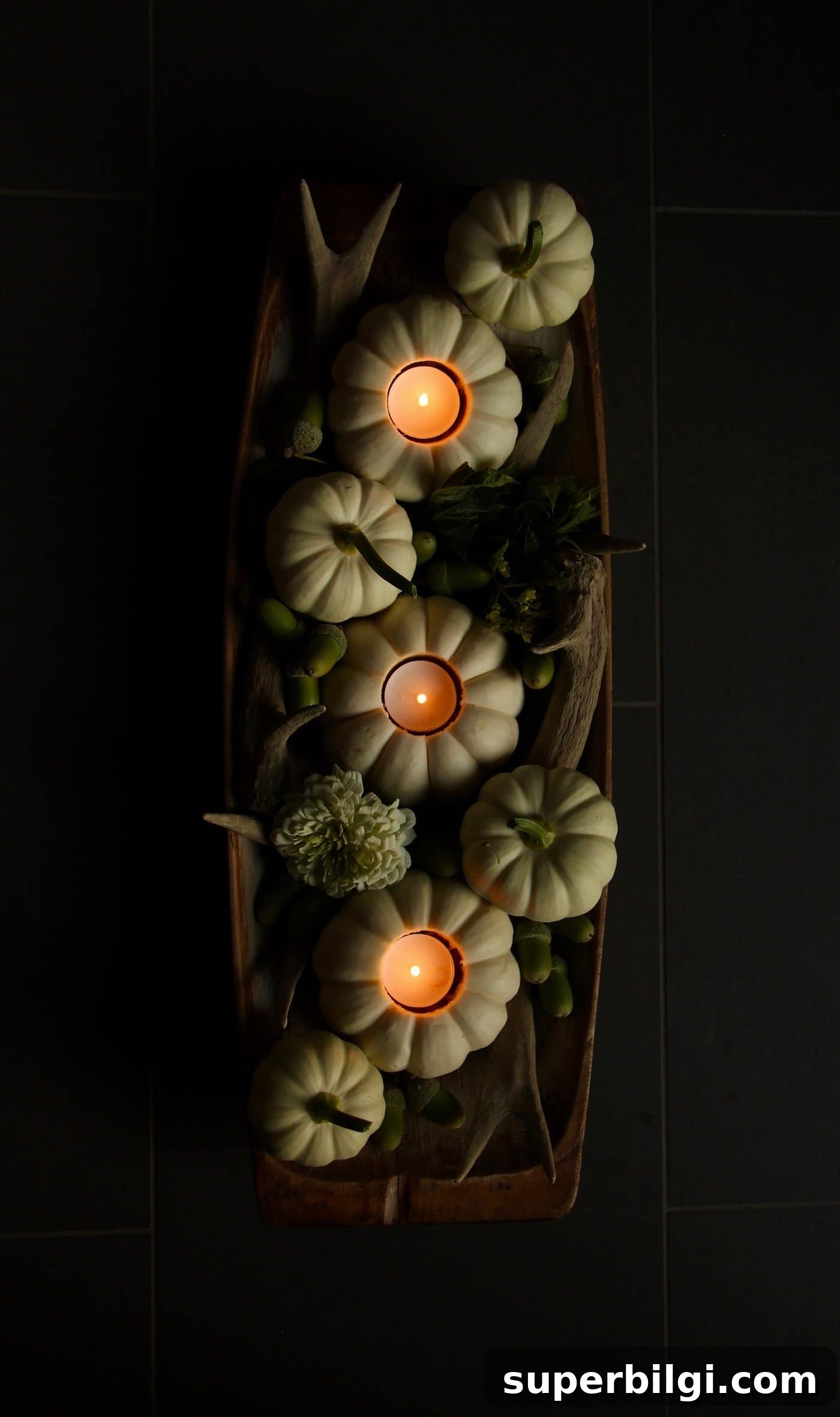 Stylish Fall Centerpiece Ideas for a Warm, Inviting Home 14 fall arrangement with pumpkins and tea lights