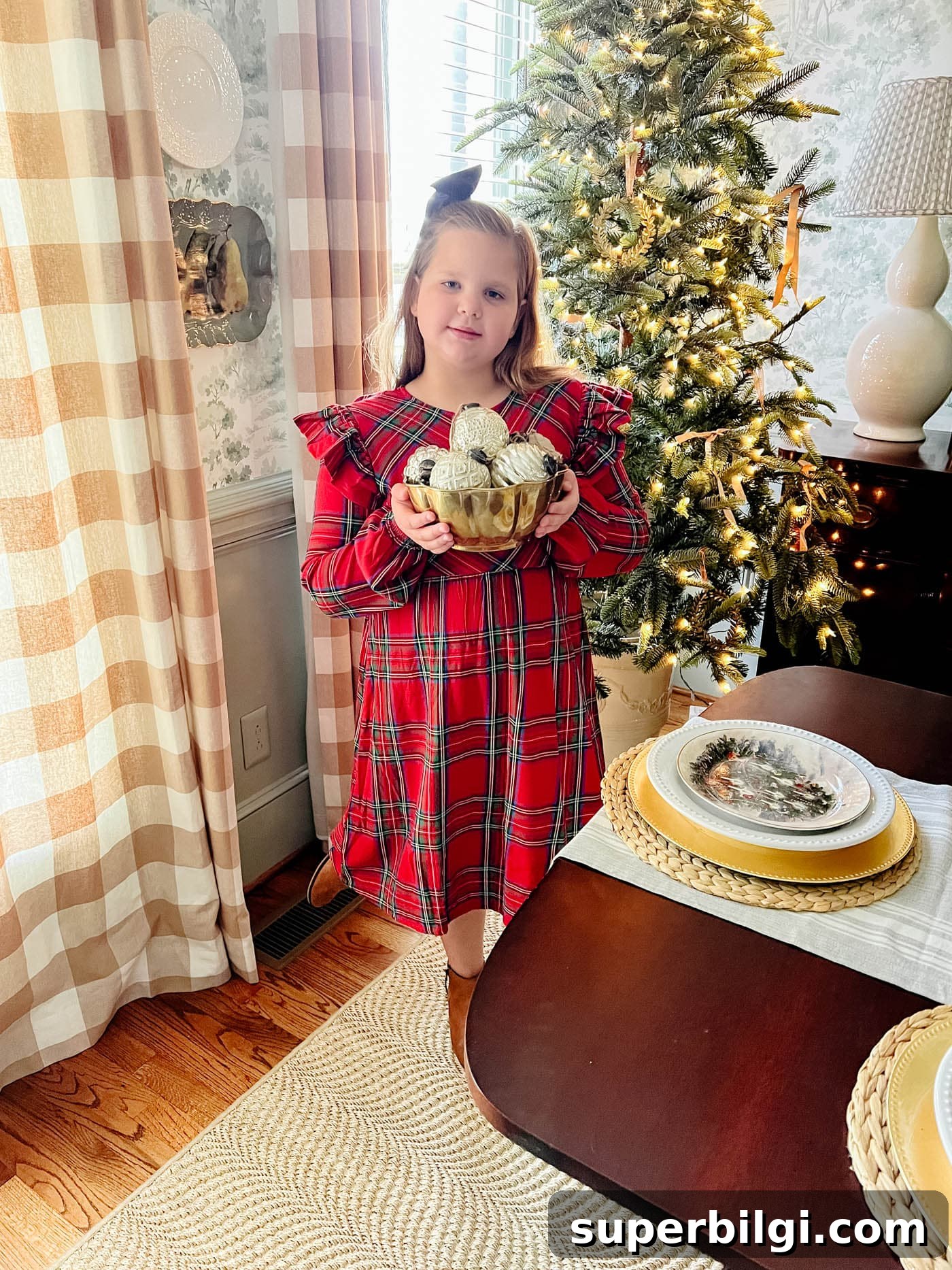Family Christmas Bucket List: 21 Holiday Ideas 5 Little girl in plaid Christmas dress