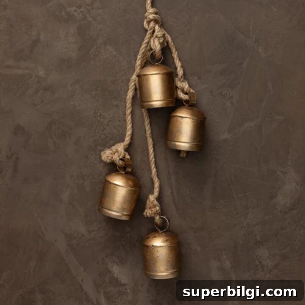 7 Creative Ways to Decorate with Christmas Bells 11 hanging iron bells
