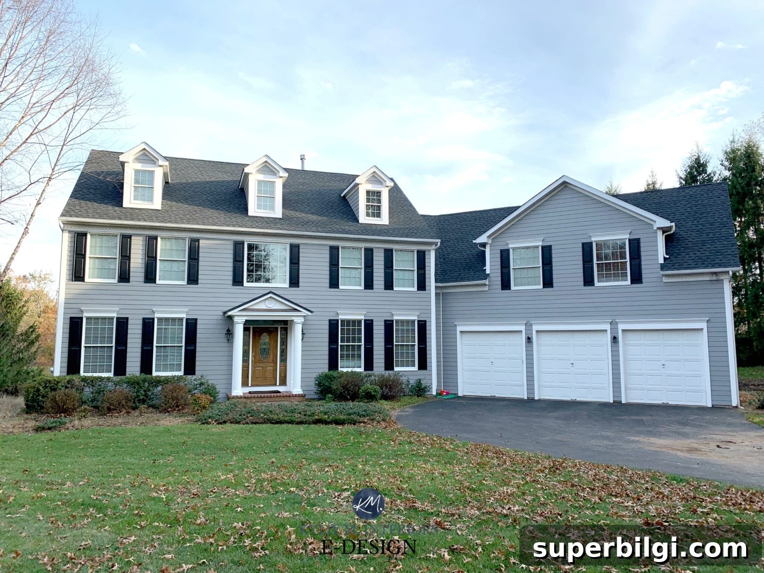 Sherwin-Williams Extra White SW 7006 Paint Color Guide 9 home exterior with gray body, black shutters, and Sherwin Williams Extra White trim