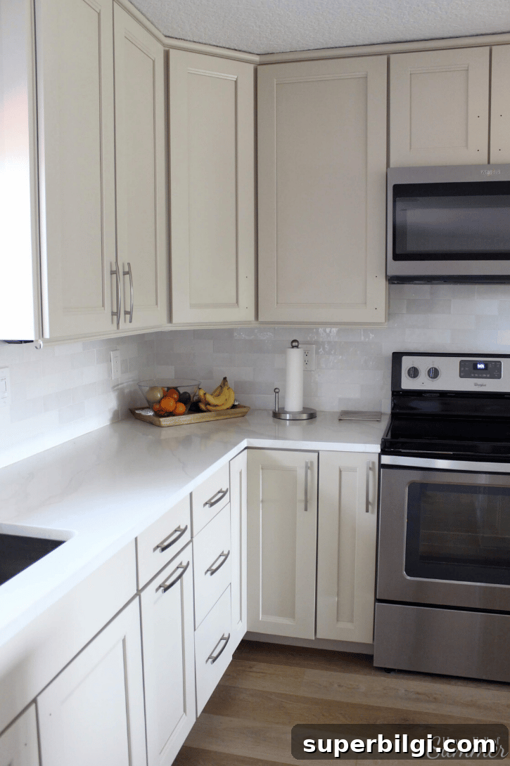 Benjamin Moore Balboa Mist: Soft Greige Paint Color 5 Benjamin Moore Balboa Mist featured on kitchen cabinets