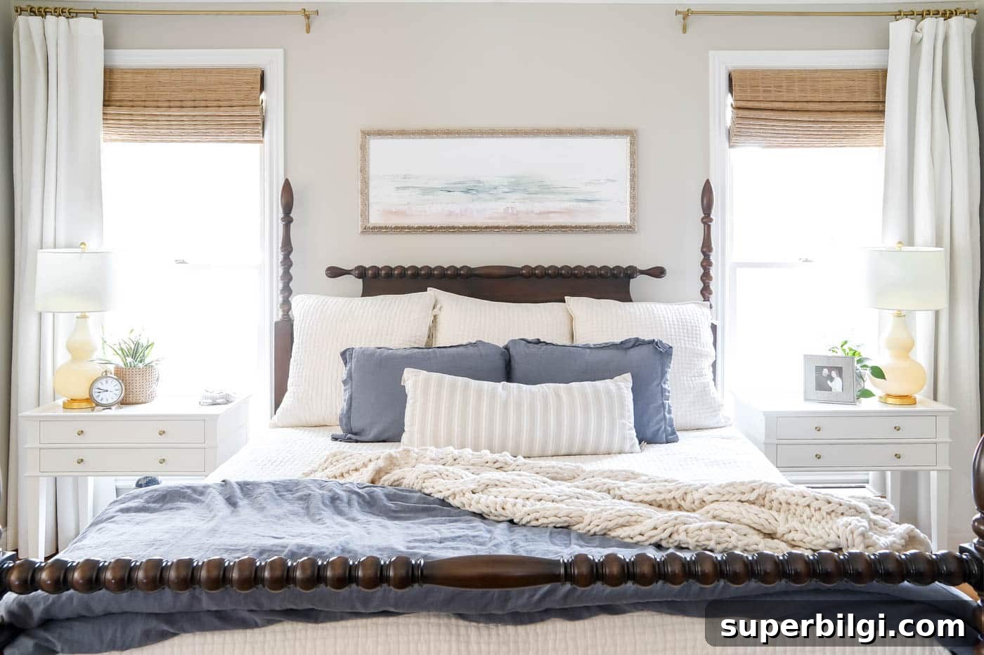 primary bedroom straight on with symmetrical nightstands.