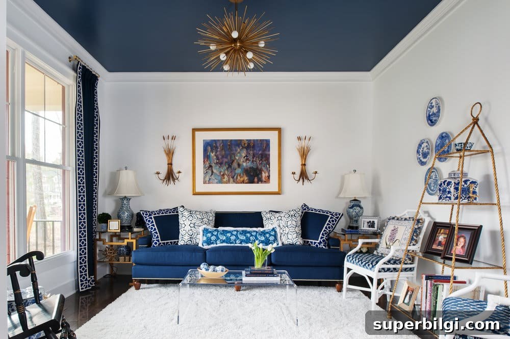 living room with navy ceiling and pops of navy throughout the room