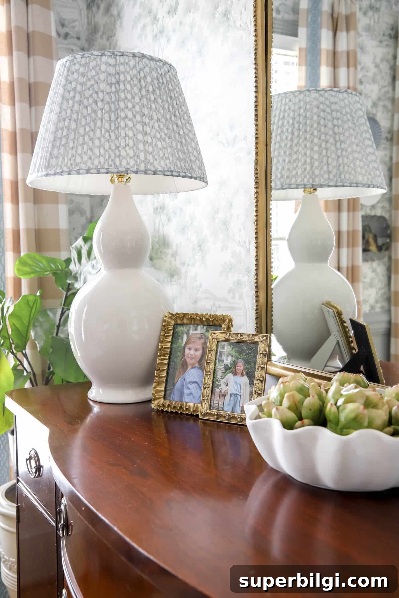 Fresh Spring Table Decor Ideas for Seasonal Entertaining 13 Faux artichokes in a bowl for spring dining room decor