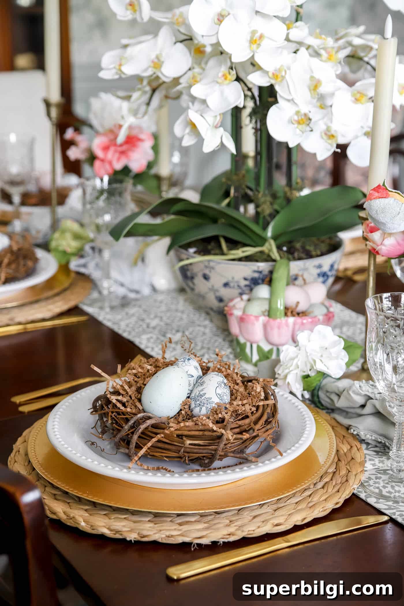 Fresh Spring Table Decor Ideas for Seasonal Entertaining 6 Simple nest with eggs at a spring table setting
