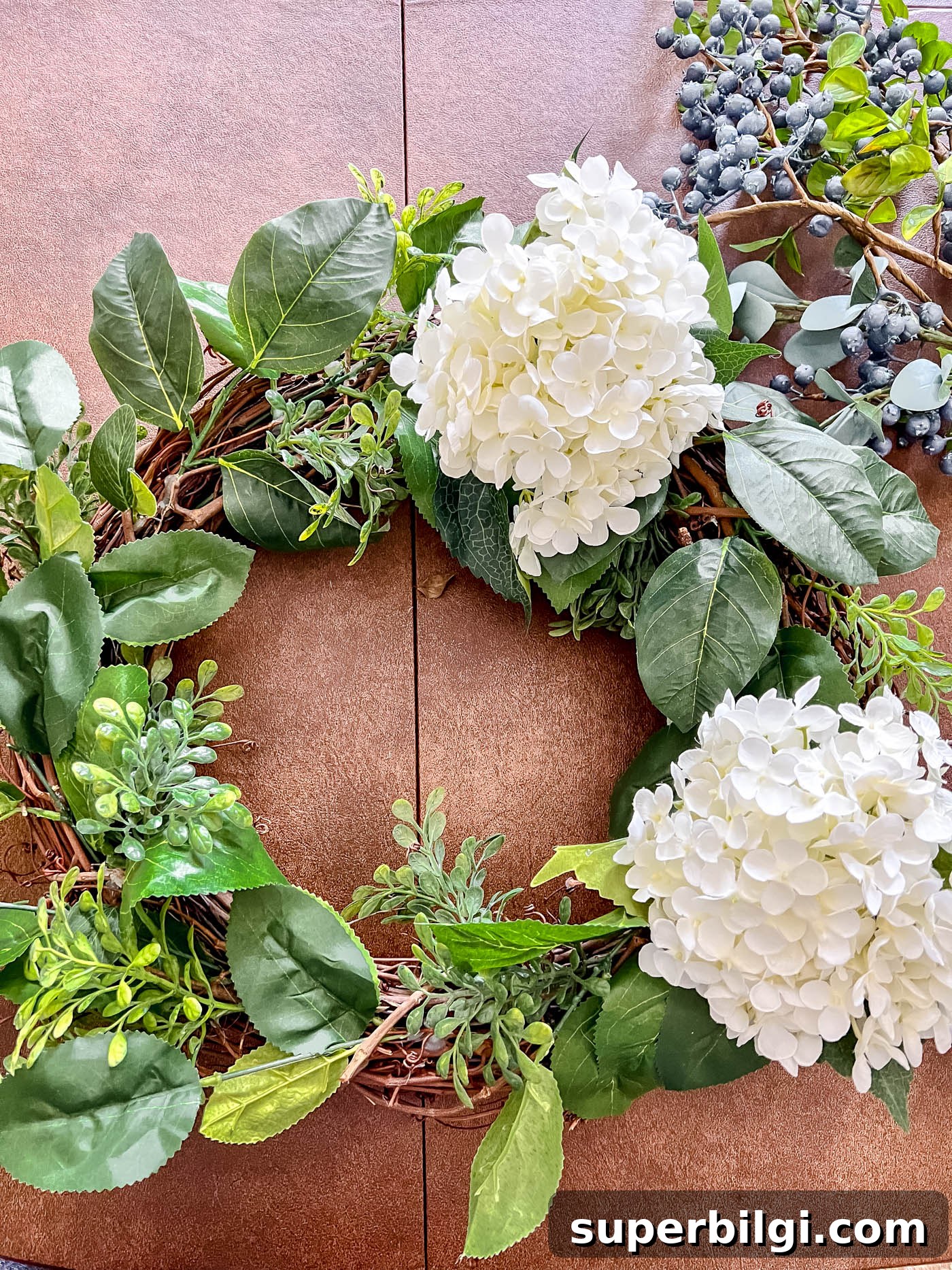 DIY Patriotic Wreath for Fourth of July & Memorial Day 5 Add hydrangeas to patriotic wreath