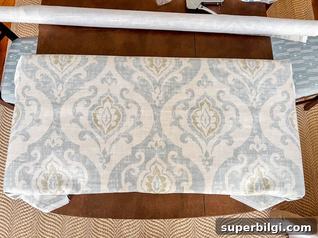 How to Make a Fabric Covered Cornice Board for Windows 13 Center the fabric when making a cornice board