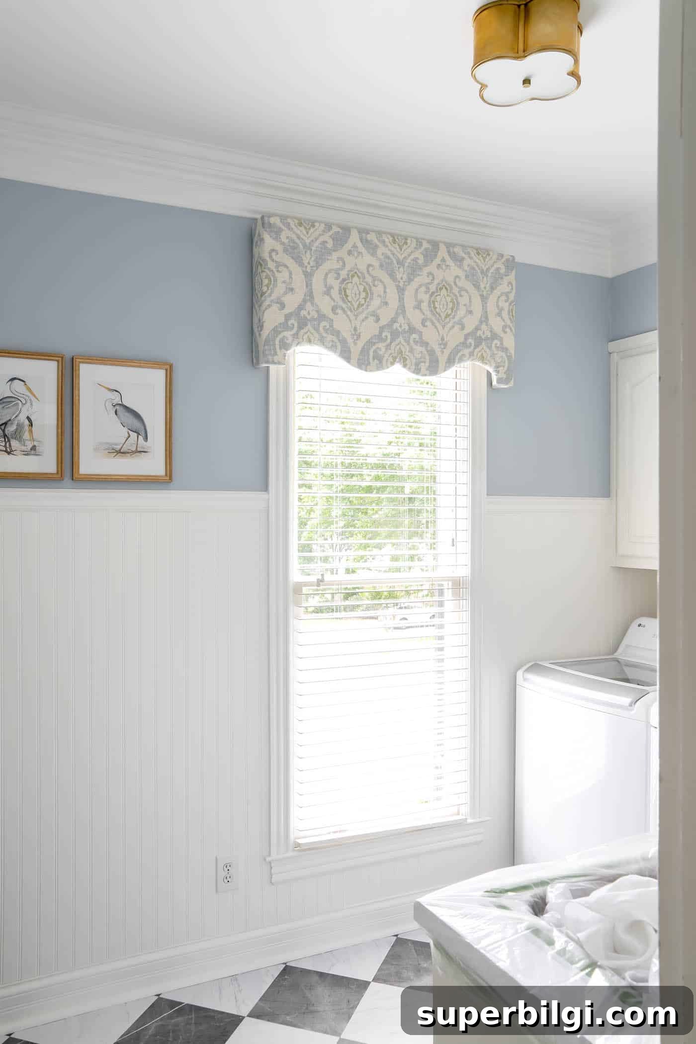 How to Make a Fabric Covered Cornice Board for Windows 19 Laundry room with blue walls and white beadboard.