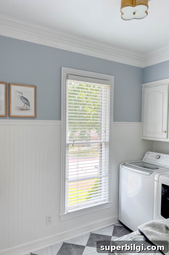 How to Make a Fabric Covered Cornice Board for Windows 4 Laundry room with blue walls and white beadboard.