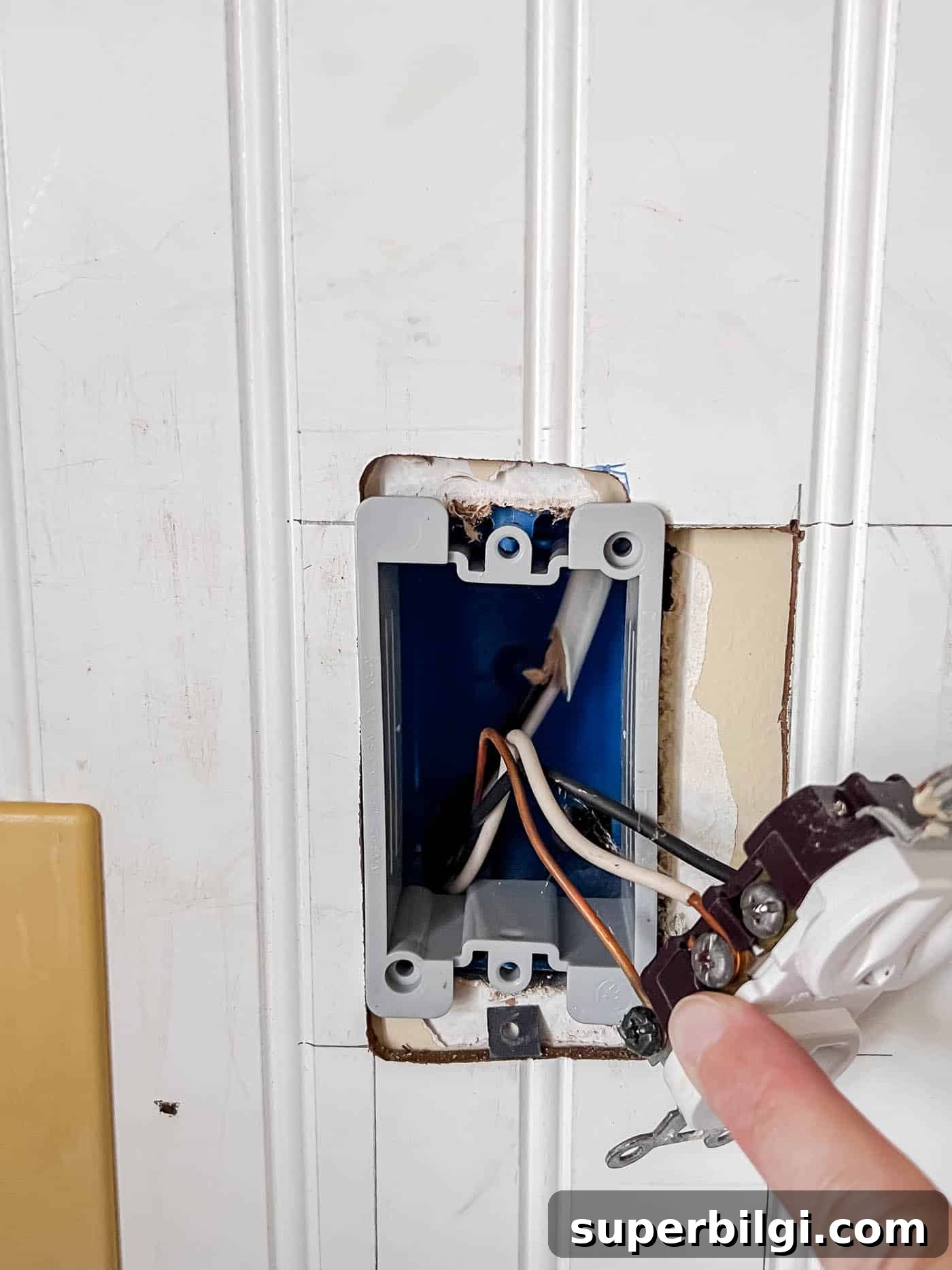 Beadboard Home Upgrades: Design Ideas, Costs and Installation 12 replacing the electrical box with extender