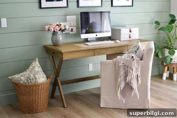desk area with shiplap on the walls painted Sherwin Williams Coastal Plain.