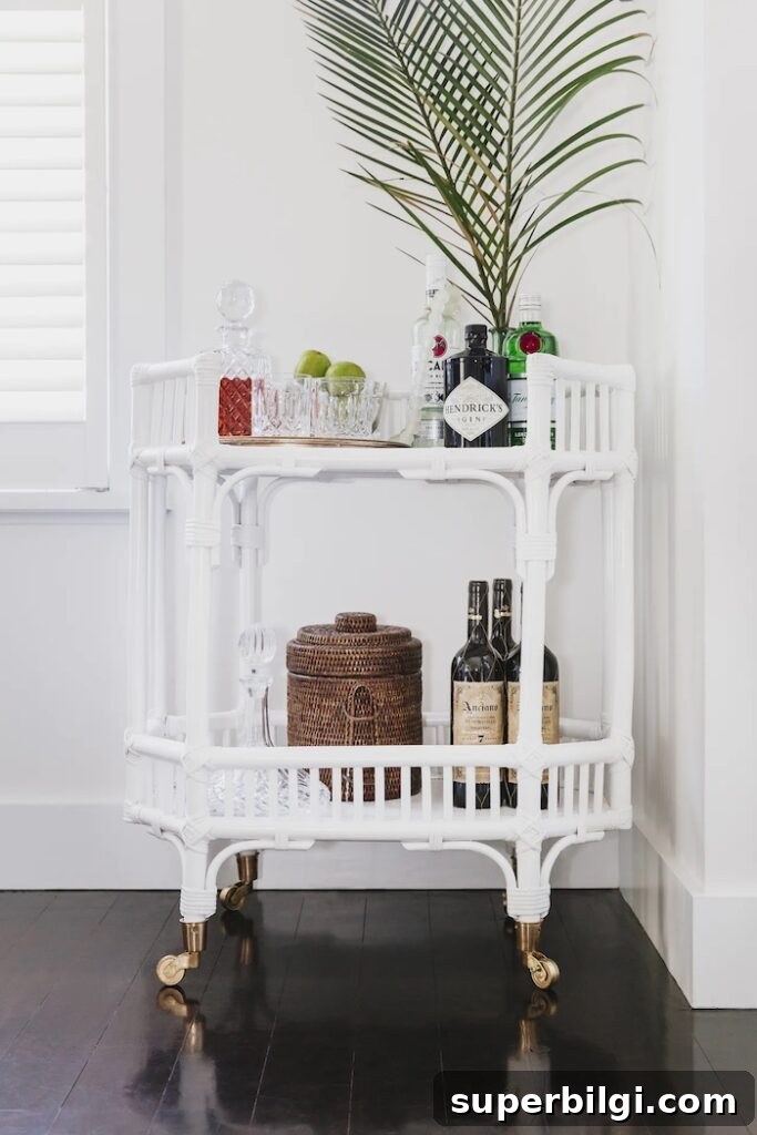 13 Creative Corner Decor Ideas to Transform Small Spaces 13 bar cart in the corner of a dining room.