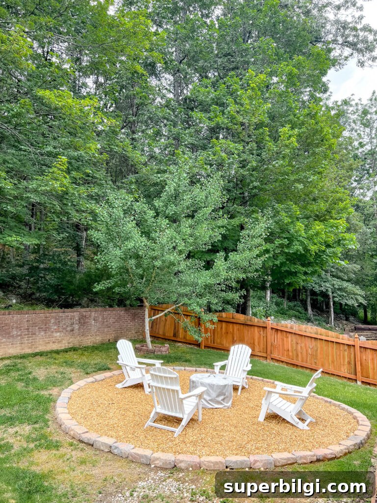 Hang Outdoor String Lights: DIY Patio and Backyard Tips 4 Gravel fire pit area with white Adirondack chairs and Solo Stove fire pit