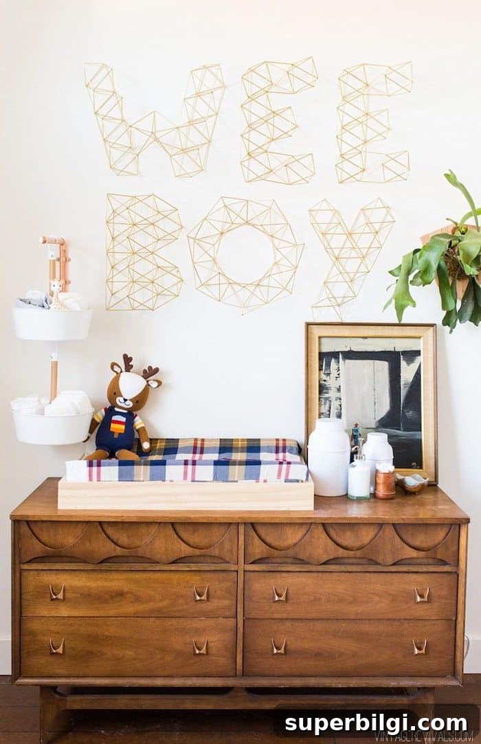 20 Nursery Paint Colors and Accent Wall Ideas for Baby Rooms 17 Boy's nursery with Sherwin Williams Alabaster wall color and
