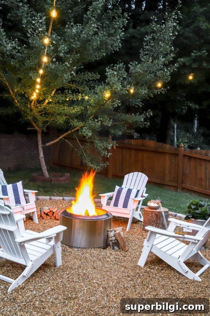 Solo stove in fire pit area with string lights.