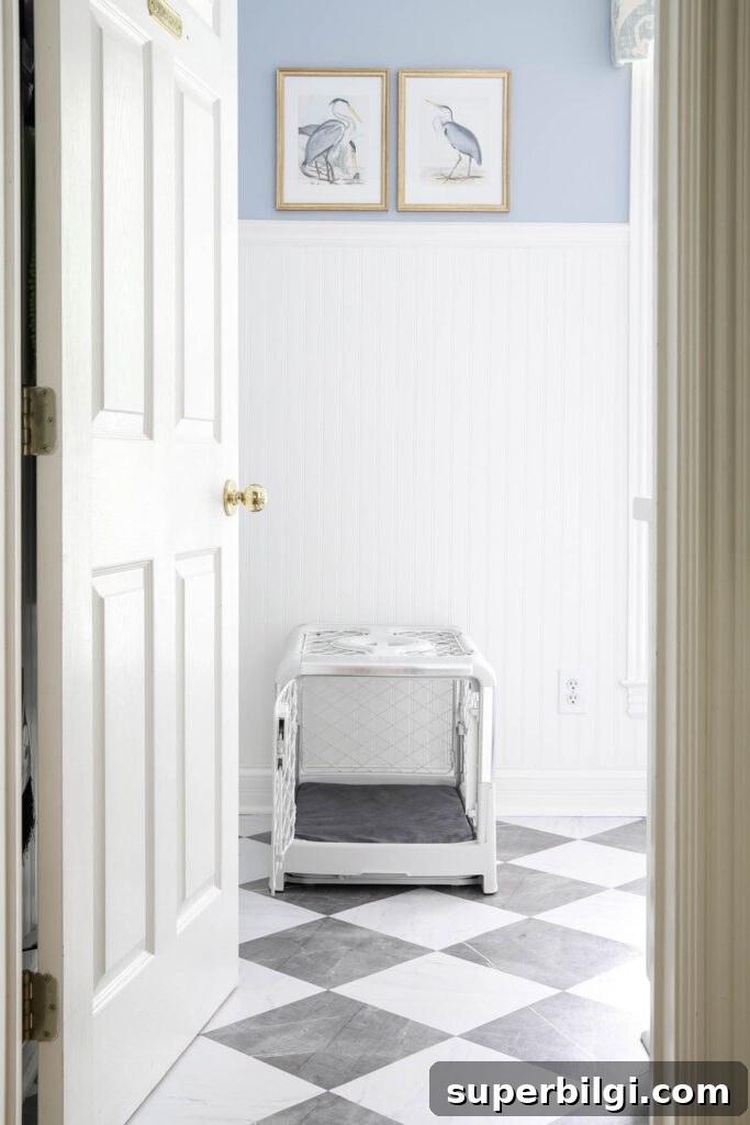 10+ Stylish Dog Crate Furniture Ideas for Modern Homes 4 Revol Diggs dog crate in white with a gray pad cover in a laundry room.
