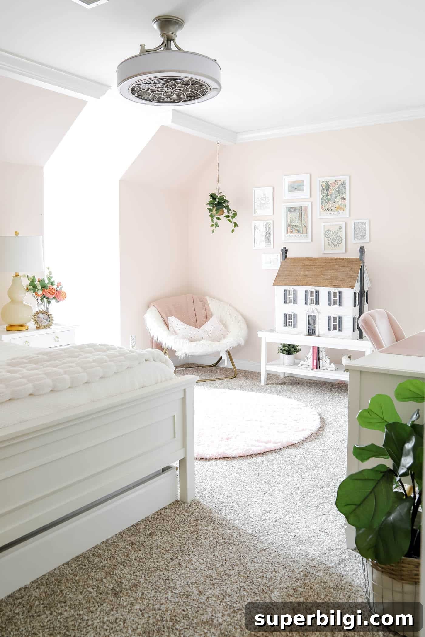 Teen Girl Bedroom Ideas: 10+ Stylish Tips and Tricks 8 pink teen girl bedroom with doll house on a white coffee table, plush chair in the corner and plant hanging from the ceiling.