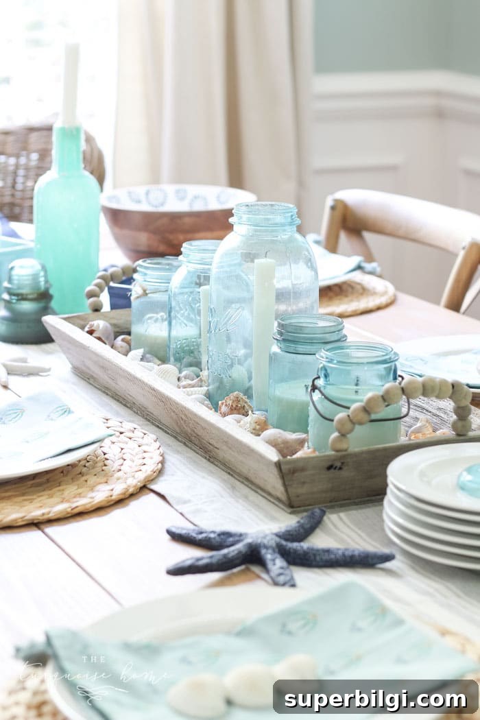 Summer Tablescapes: Stylish Ideas for Outdoor Entertaining 11 beachy table decor in the dining room for summer.